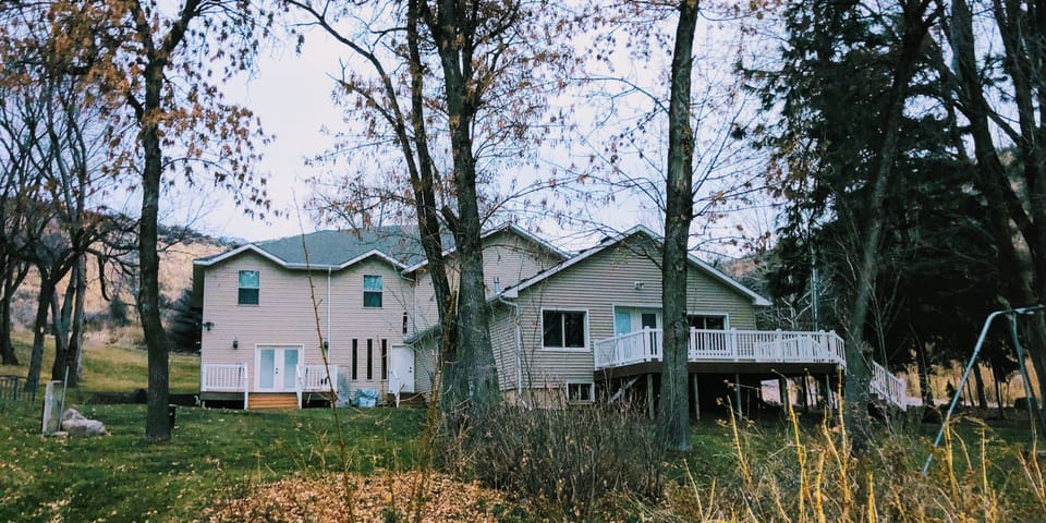 Upstairs main area w/full kitchen, TV, gas stove, exercise eqpt. & walk out deck