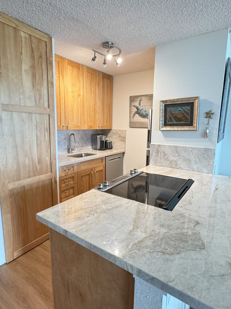 Modern appliances and scenic views make cooking a breeze in this stylish space!