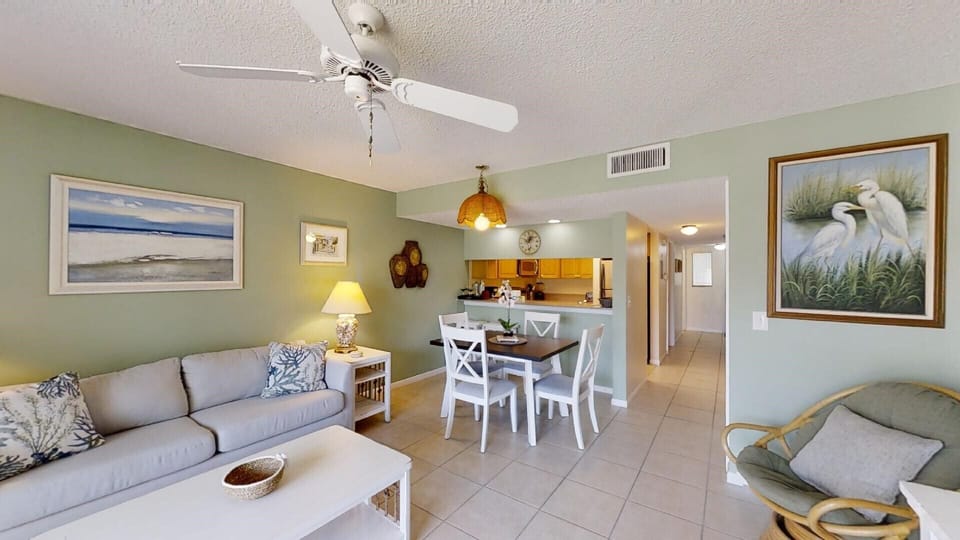 living area view to dining and kitchen