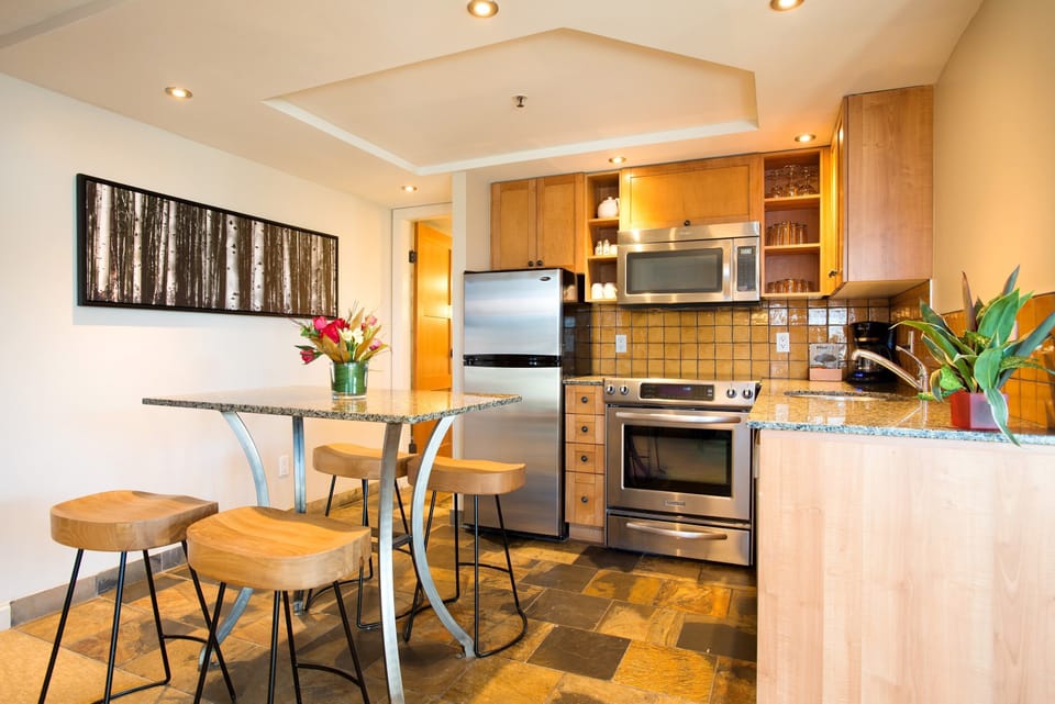 The gourmet kitchen comes fully-equipped and has everything you need to cook up a storm.