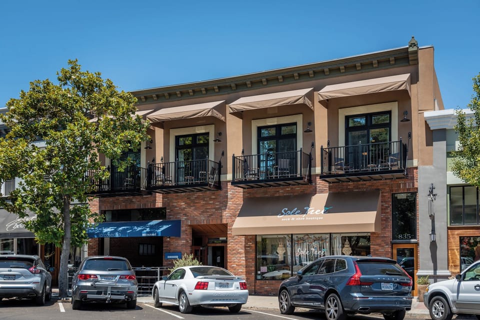 Balconies and storefronts bring a lively downtown feel
