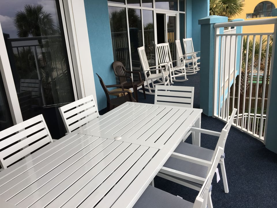 Huge Oceanfront Balcony with Table & Rocking Chairs