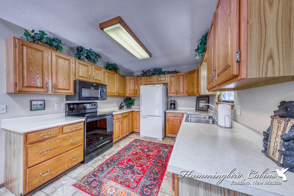 Kitchen is fully stocked with most anything you need to cook with.
