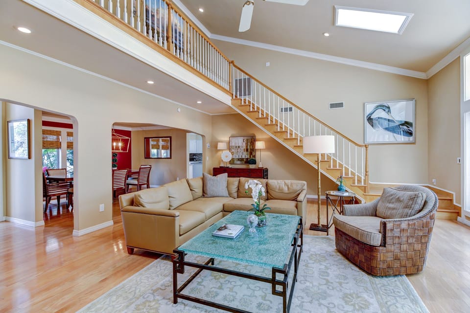 Living room and stairs to both guest bedrooms
