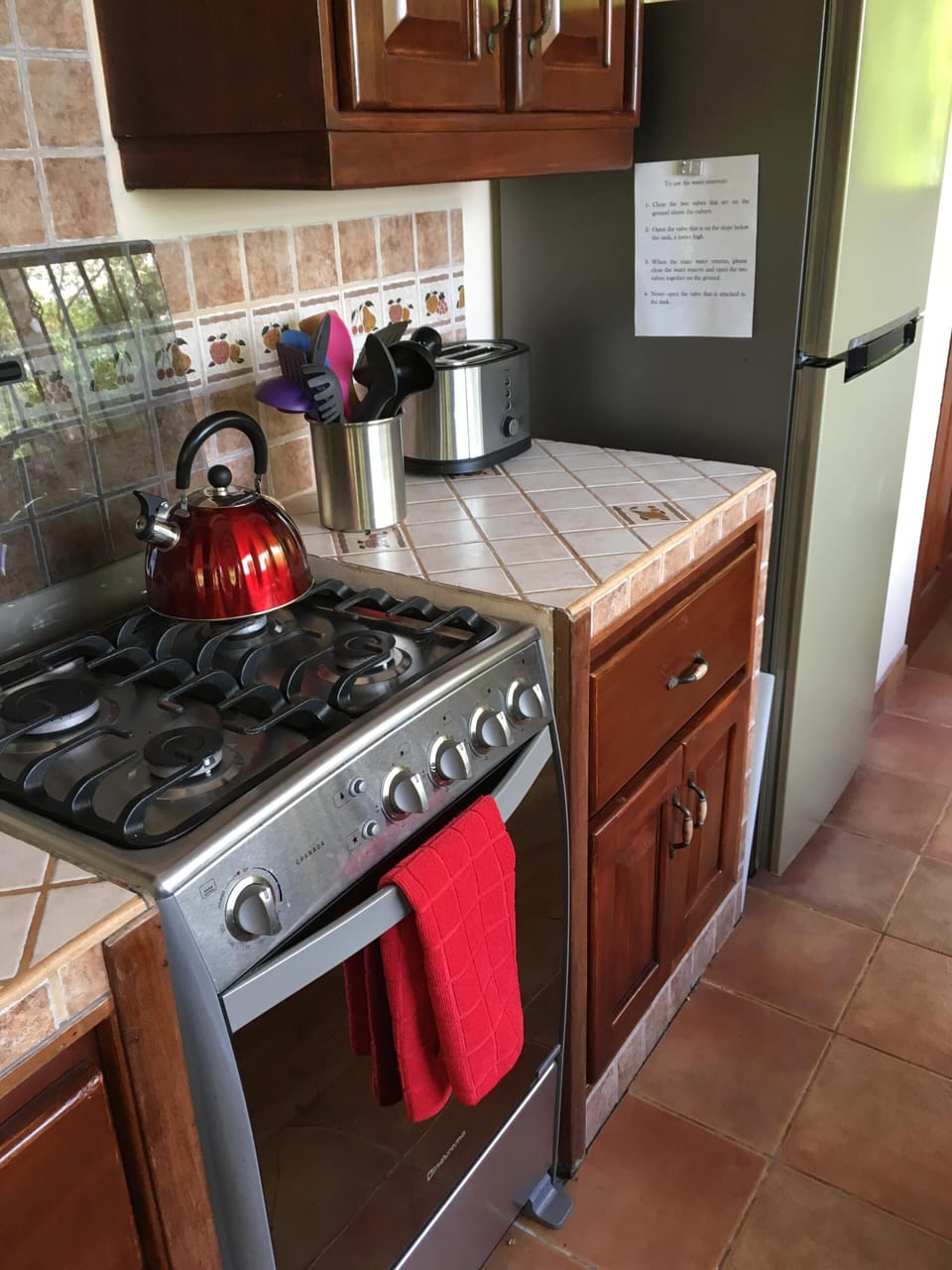 Full size frig and stove w/ additional counter space