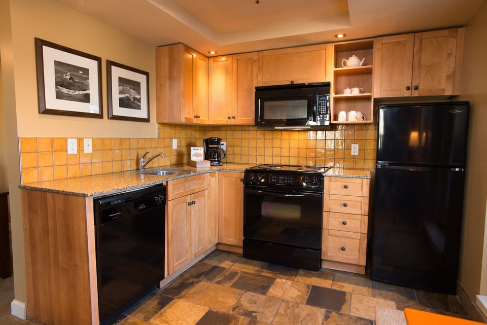 The kitchen comes fully-equipped to cater to your inner gourmet.