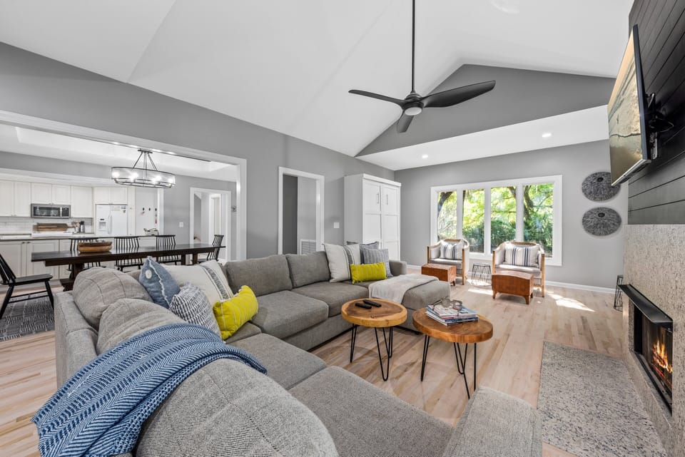 The living, dining and kitchen area open onto each other.