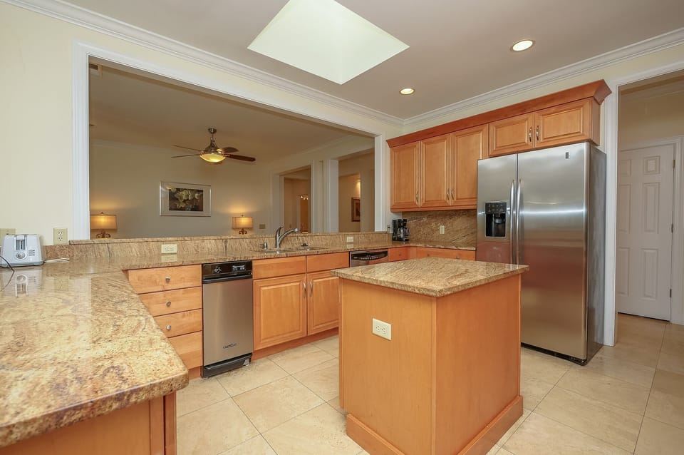 Large open concept kitchen, granite countertops,  stainless steel appliances