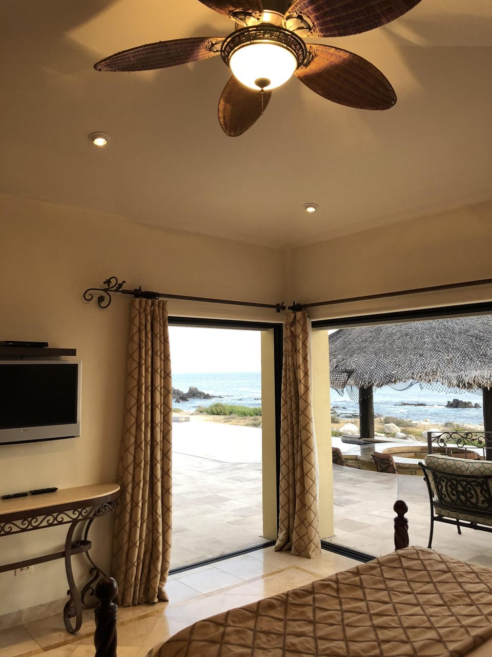 Casa Stephens Master Suite 2 with corner pocket doors leading to the pool deck