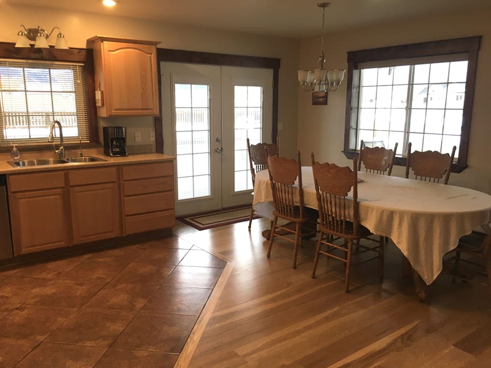 View from hallway to bedroom on main floor.