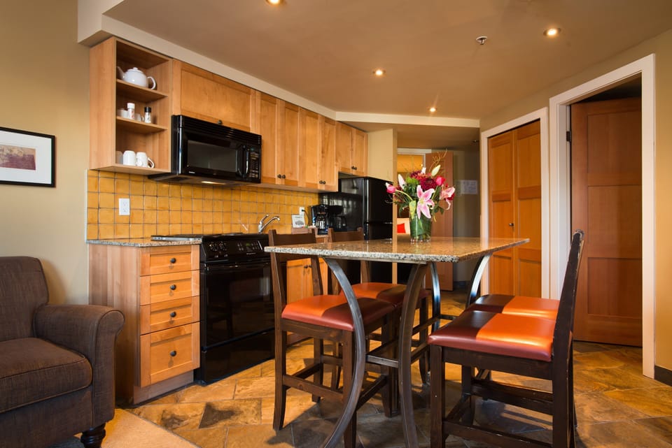 The gourmet kitchen comes fully-equipped for you to cook up a storm!