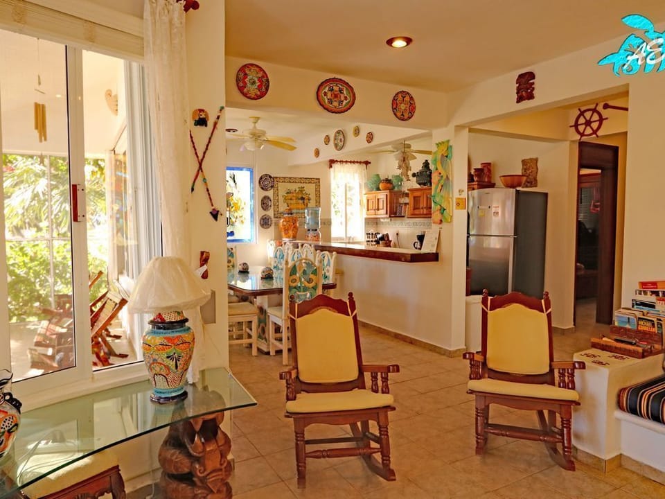 Looking from the Living to the Dining and Kitchen: Mayan Craftsmanship Abounds