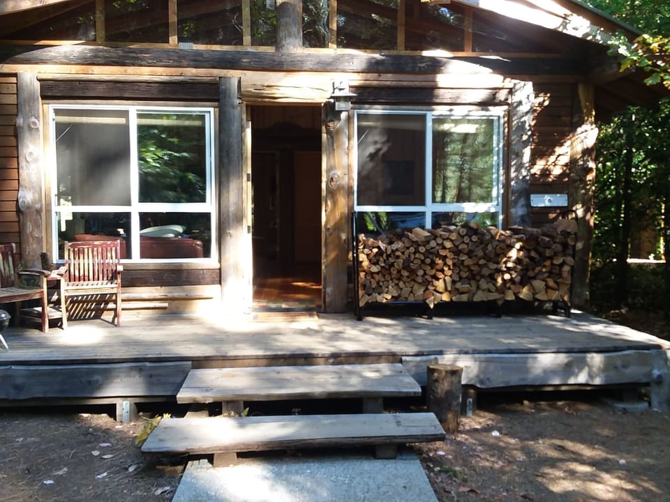 Shamballa cabin winter firewood stack