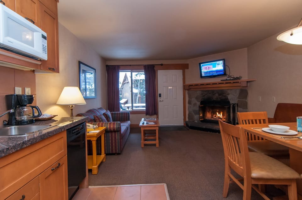 Snuggle up by the grand wood-burning fireplace and put on a great movie.