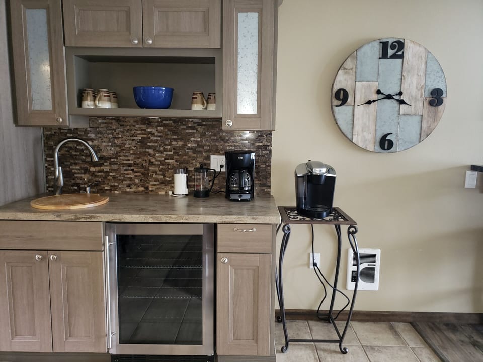 Beverage cooler, sink and coffee bar