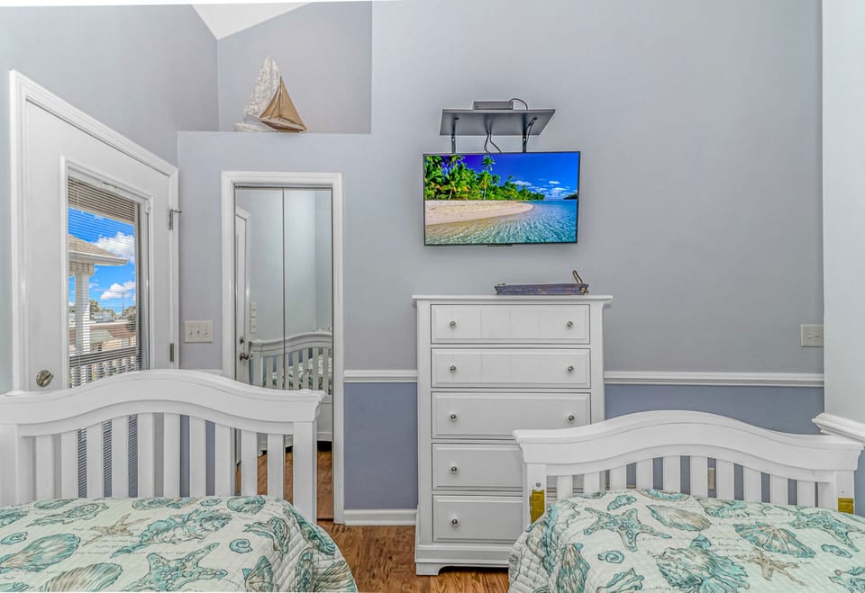 4th bedroom, with access to the 2nd floor patio