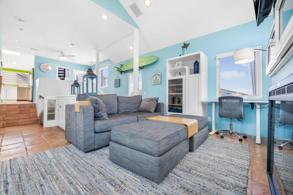 Comfortable living room w sleeper couch work space and high speed internet.   