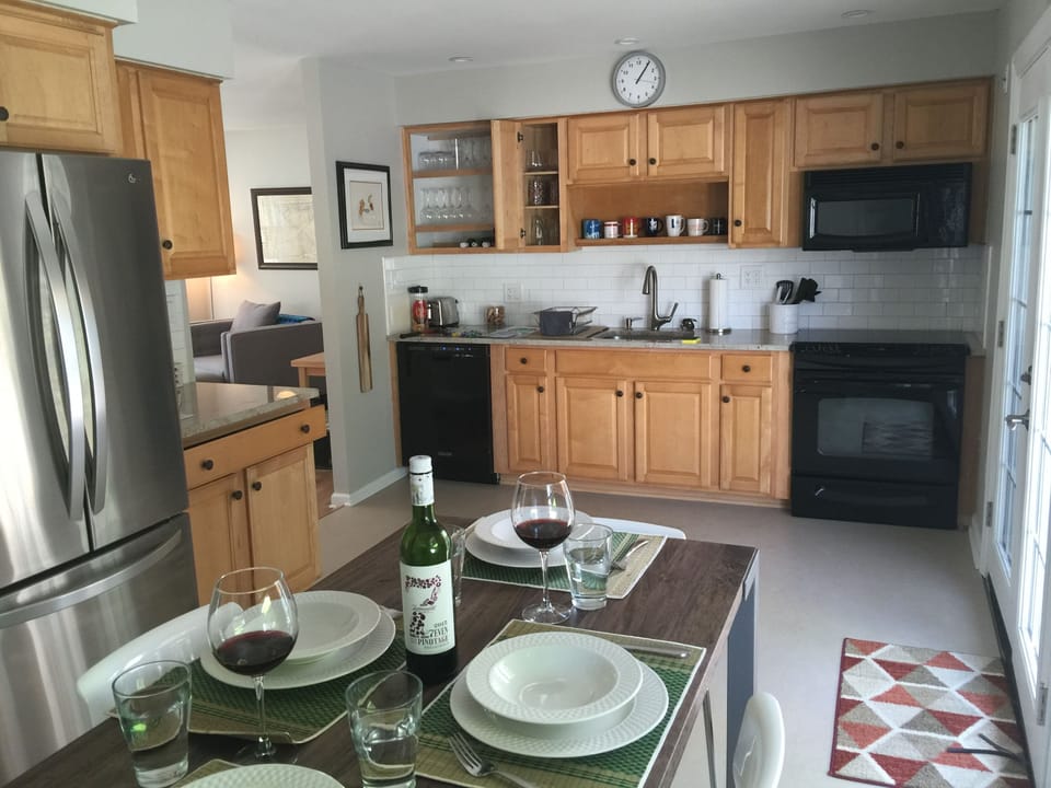 large kitchen is ready for home cooking or maybe even takeout
