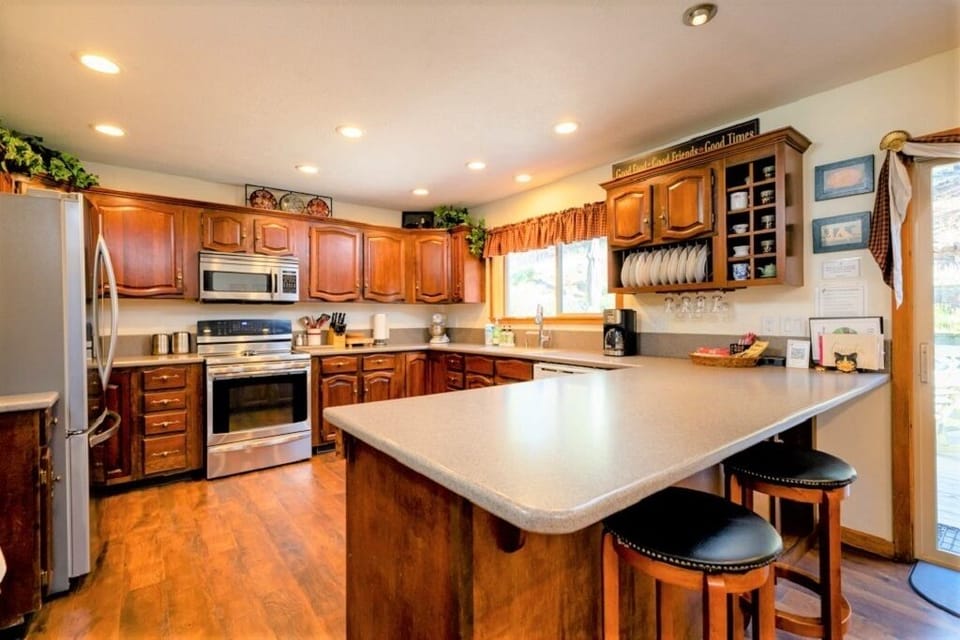 Large Kitchen with island, waffle bar, and dishwasher