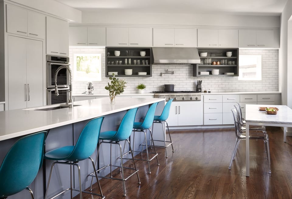 State of the art kitchen, with 48" range, double ovens, wine fridge & pantry.