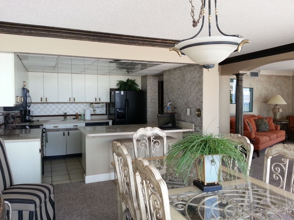 Dining Table seats 8 plus 2 counter stools. 