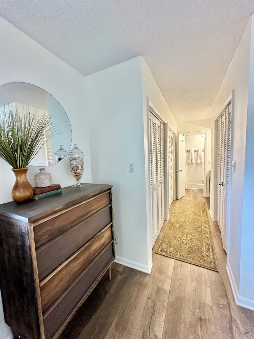 Back hallway, leading to vanity area and master bathroom. 