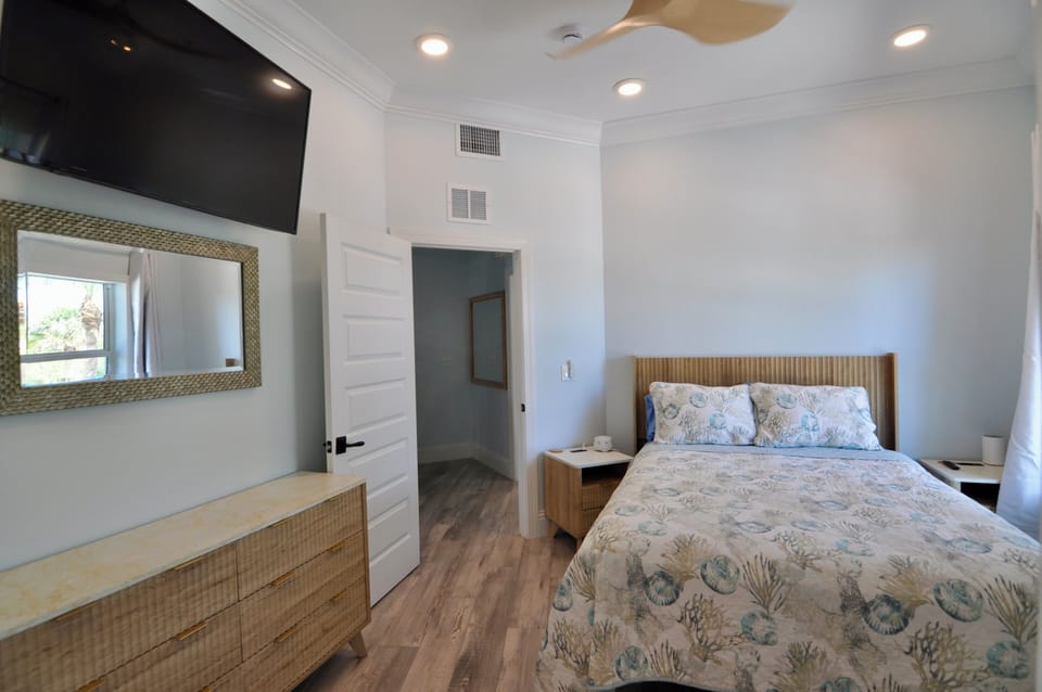 Queen Boat bedroom 5 with shared Jack & Jill bathroom 5 & 50" TV
