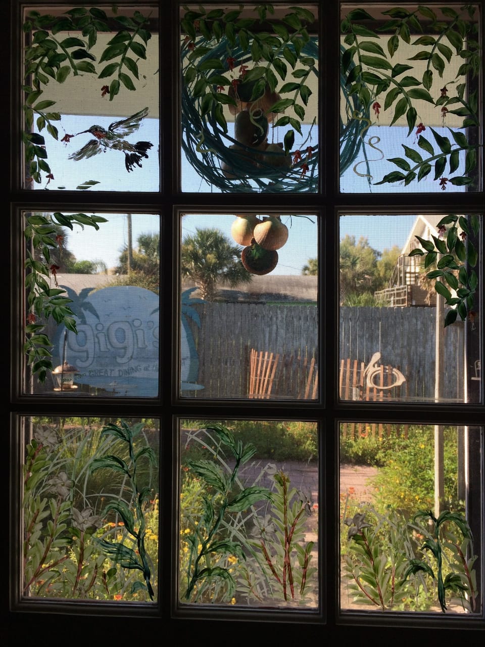 VIEW FROM  HANDPAINTED BACK DOOR WINDOW.