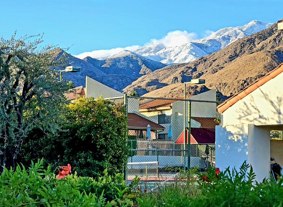Beautiful snow-capped mountains after recent rain