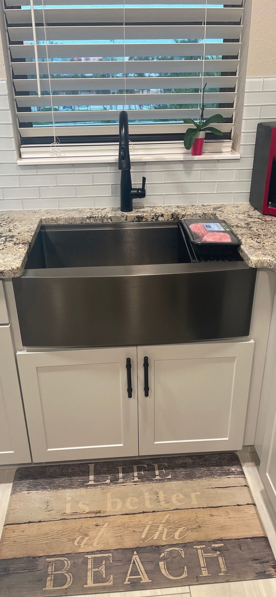 Apron sink has built in work station with draining rack, cutting board &strainer