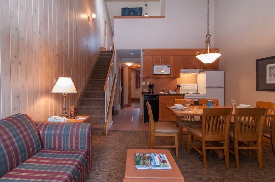 This gorgeous mountain condo features an open-plan living area.