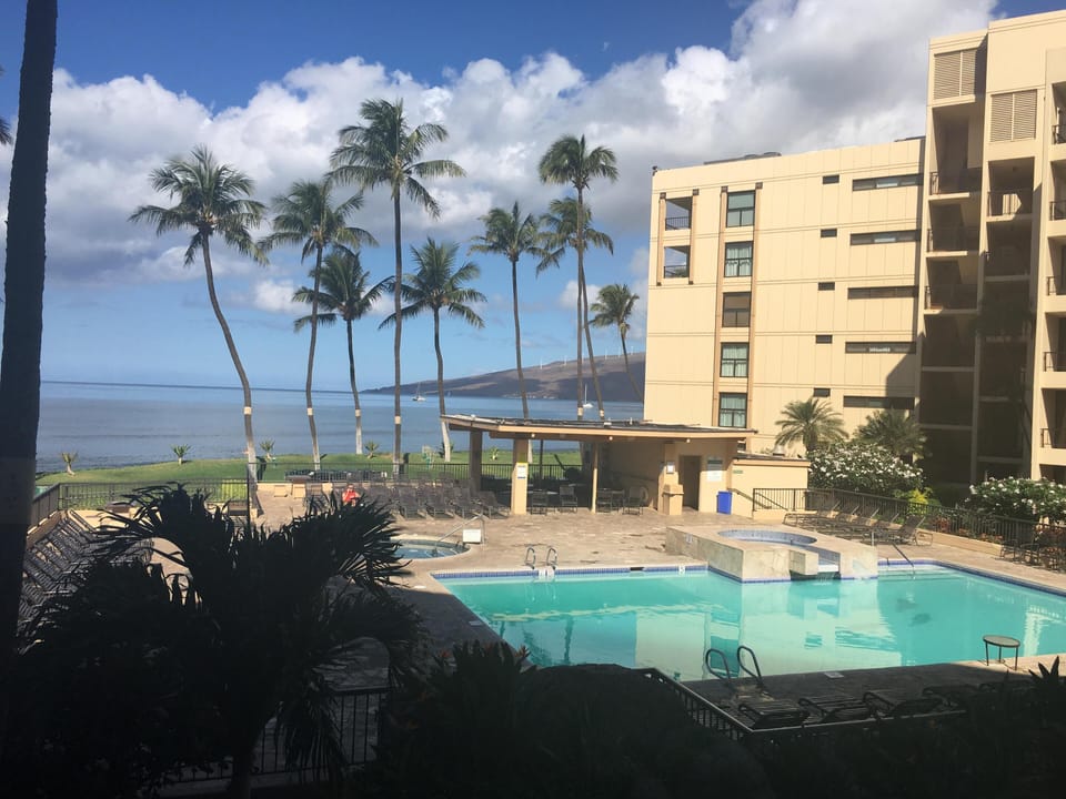 View overlooking pool out to the blue Pacific Ocean 