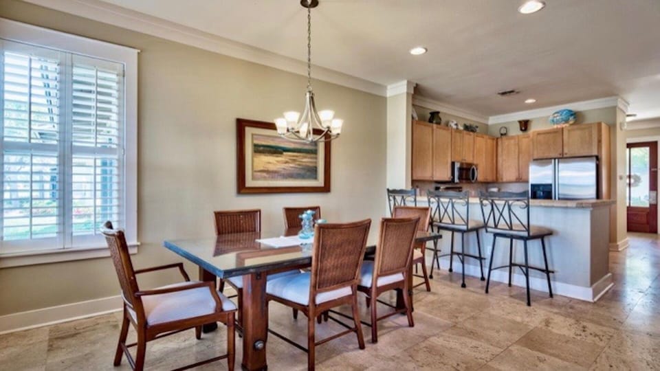 Luxurious Travertine Tile Floors Throughout.