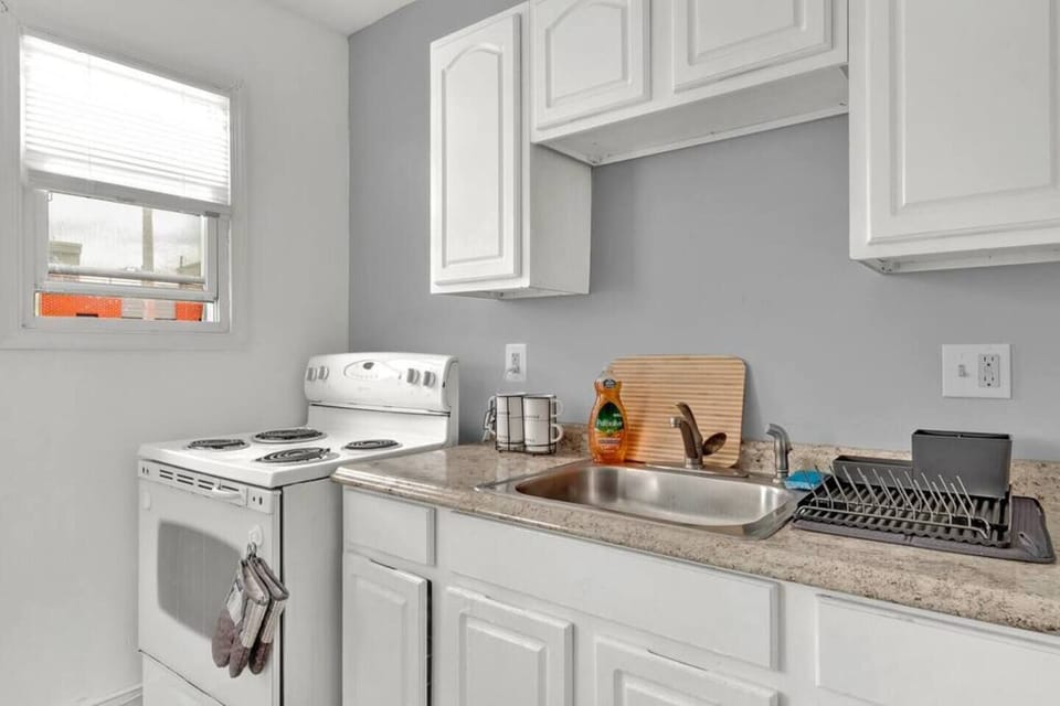 Fully equipped kitchen with modern appliances and ample space for all your cooking needs.