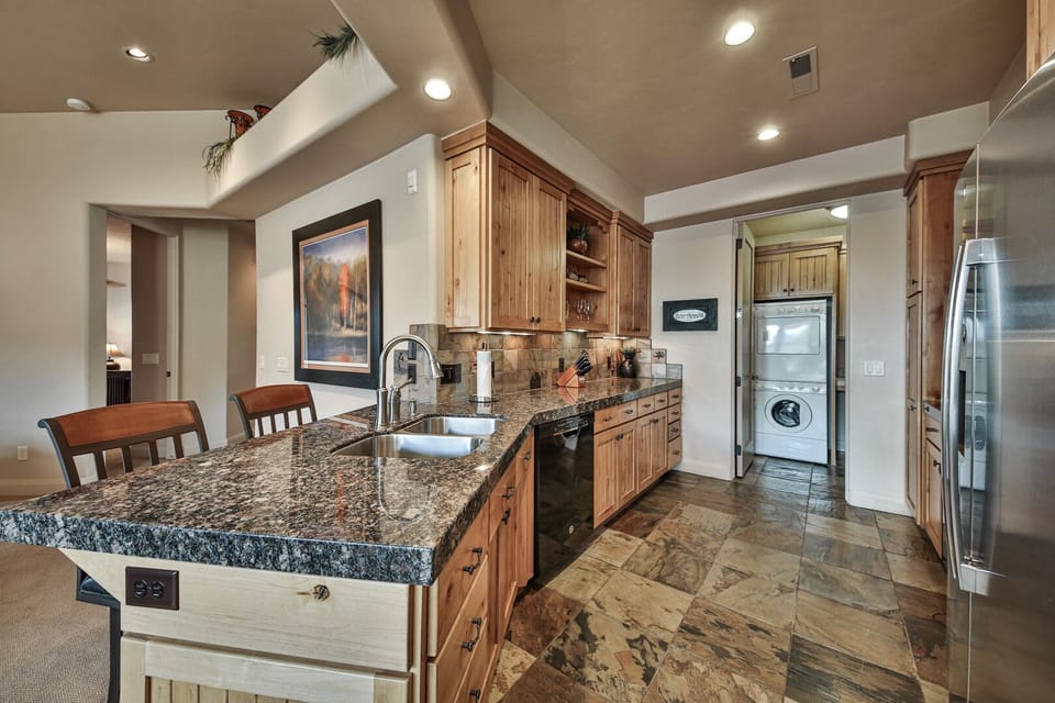 Large Kitchen With All Dishes & Cookware Plus Laundry Room Off Garage Entryway