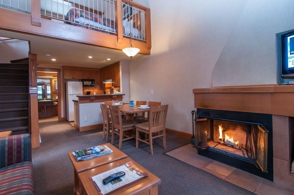 Share laughs with your group by the majestic wood-burning fireplace (firewood included).