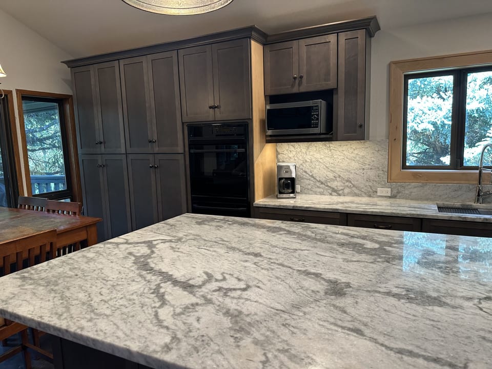 Newly remodeled kitchen with granite counter tops and new cabinets