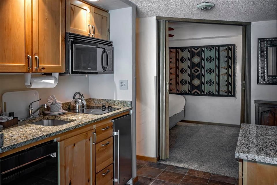 Compact kitchenette for added convenience during your stay.