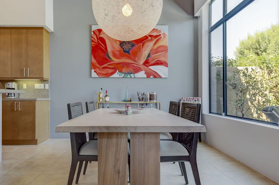 The indoor dining area with seating for six