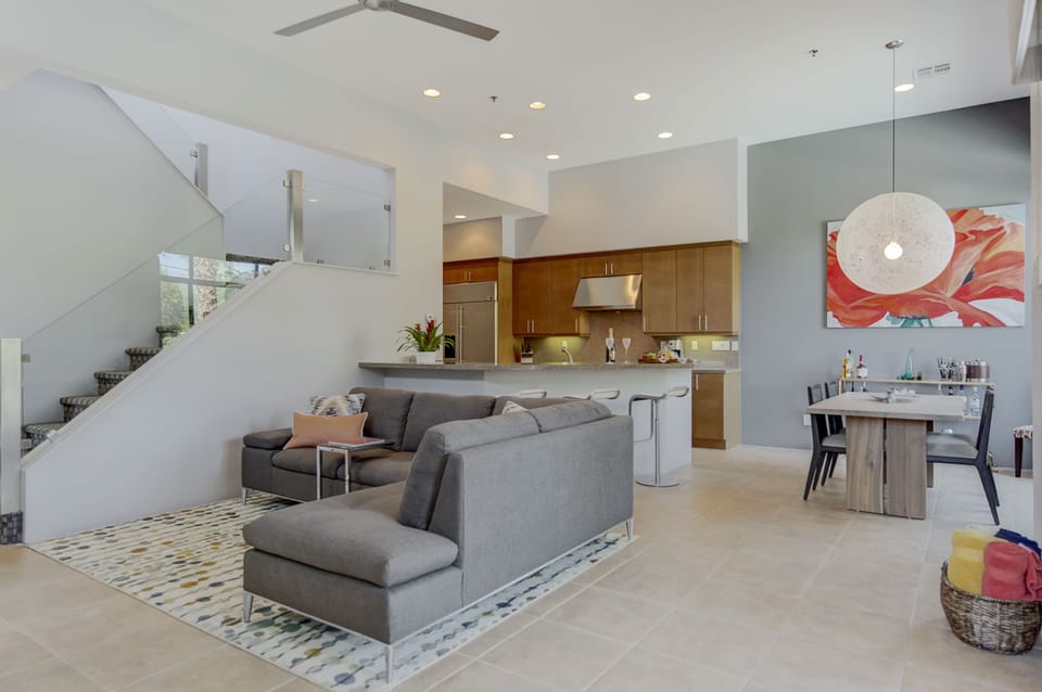 The spacious living, dining and kitchen area