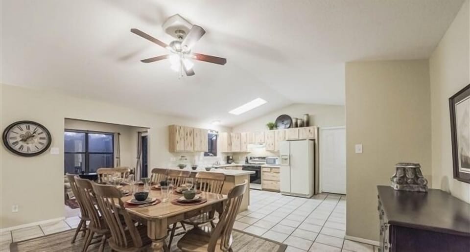 Living room opens to dining and kitchen