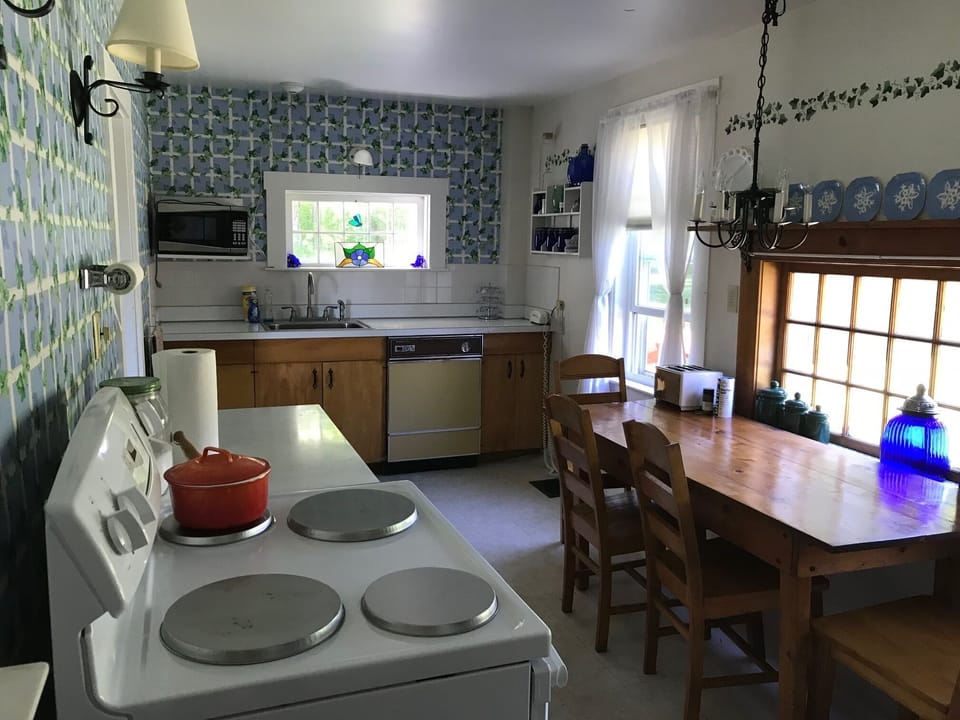 kitchen with new stove and microwave