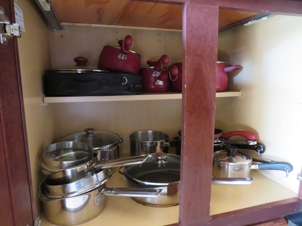 Plenty of cookware. 03/22