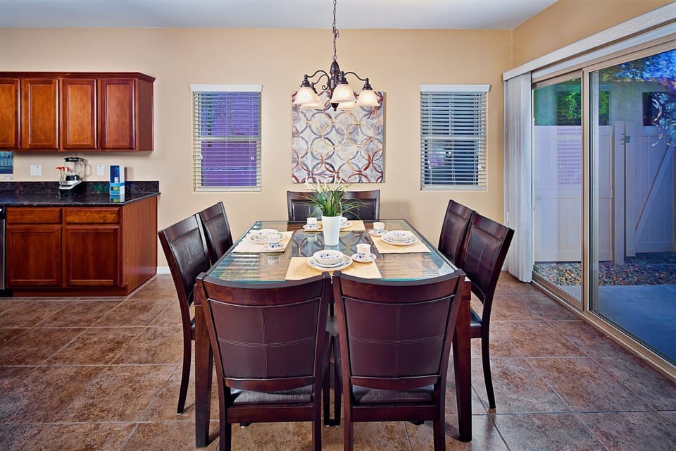 Formal dining area opens to kitchen and seats 8 comfortably.