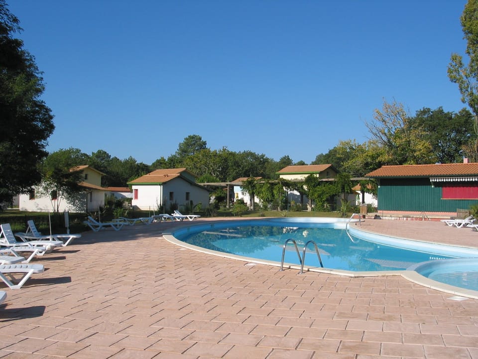 Relax in the coastal sunshine, and enjoy direct access to the beach.