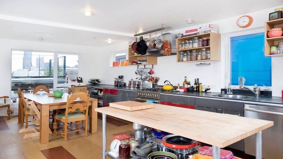Dining area, table extends to 108 inches, city views. 