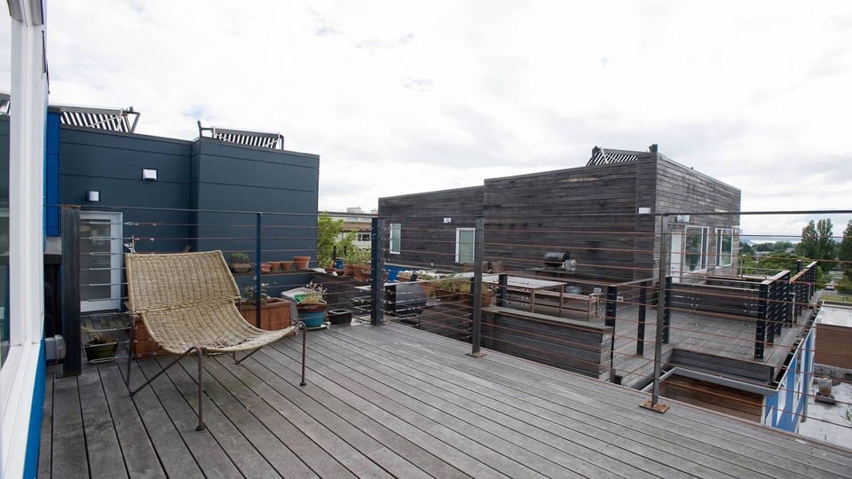 View South from master suite deck.  City & mountain views from bedroom window to the west.