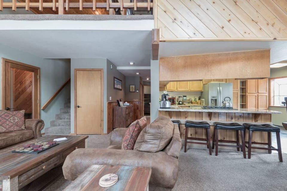 Open kitchen space overlooking the living space and dining room