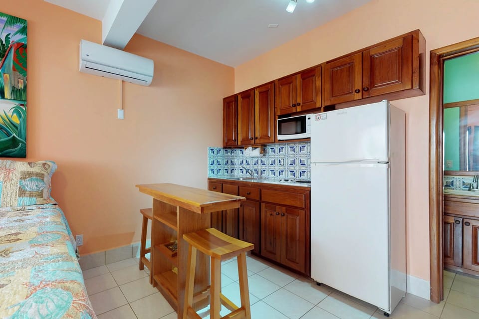 The appliances you need for preparing your meals are available in the kitchen