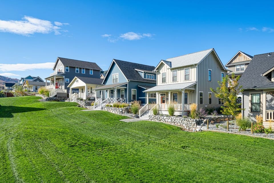 Fronting the 1.5 acre Vineyard Park